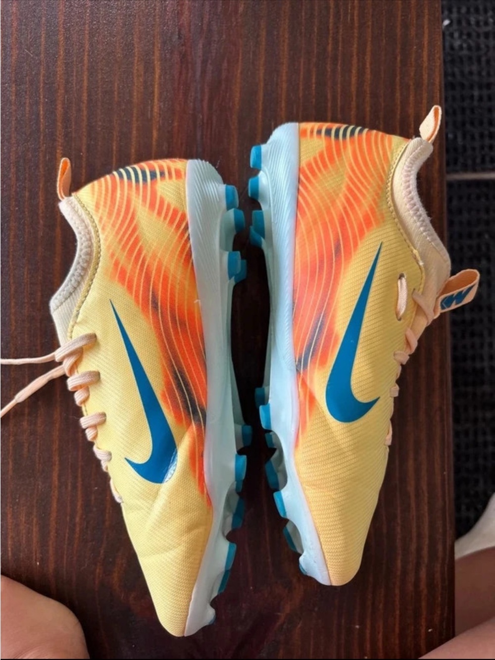 Kids Nike Yellow & Orange Athletic Sneakers with Blue Swoosh